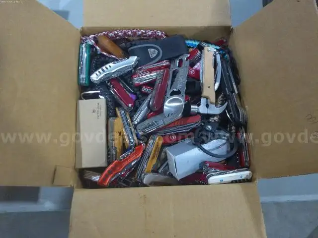 Lot of (34 lb) of Large Swiss Army Knives.