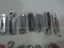 Lot of (64) Small Leatherman Multi-tools.