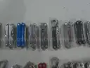 Lot of (64) Small Leatherman Multi-tools.