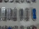 Lot of (64) Small Leatherman Multi-tools.