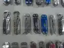 Lot of (64) Small Leatherman Multi-tools.