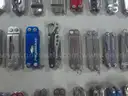 Lot of (64) Small Leatherman Multi-tools.