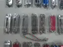 Lot of (64) Small Leatherman Multi-tools.