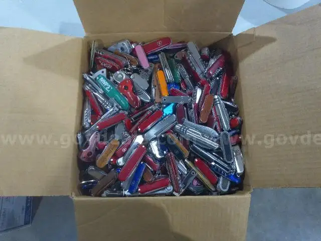 Lot of (37lbs) of Swiss Army Knives.