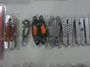 Lot of (50) Assorted Large Multi-tools.