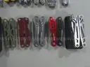 Lot of (50) Assorted Large Multi-tools.