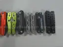 Lot of (50) Assorted Large Multi-tools.
