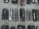 Lot of (50) Assorted Large Multi-tools.