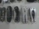 Lot of (50) Assorted Large Multi-tools.