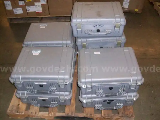 Lot of (9) Hard Plastic Shell Carrying Cases.