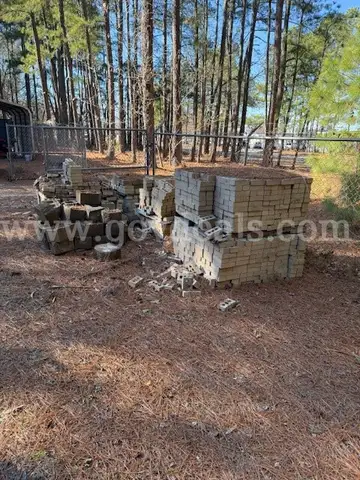 12 pallets of tan bricks