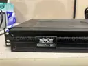 (1) 110-WATT TWO WAY RADIO, &#x26; (1) TRIPPLITE (SURGE PROTECTOR)