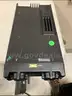 (1) 110-WATT TWO WAY RADIO, &#x26; (1) TRIPPLITE (SURGE PROTECTOR)