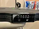 (1) 110-WATT TWO WAY RADIO, &#x26; (1) TRIPPLITE (SURGE PROTECTOR)