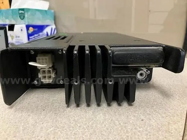 (1) 110-WATT TWO WAY RADIO, &#x26; (1) TRIPPLITE (SURGE PROTECTOR)