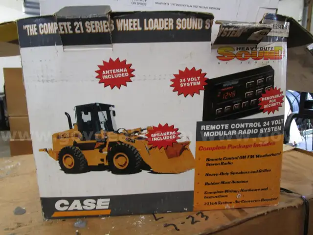 Tractor windshield washer control handles, Dump truck radiator &#x26; Toll chest. Radio system (5 Items).