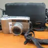 (3) DIGITAL CAMERAS