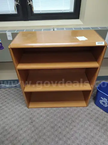 Bookshelf, White Plastic File Cabinet, and Five-Drawer Vertical File Cabinet