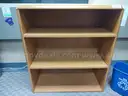 Bookshelf, White Plastic File Cabinet, and Five-Drawer Vertical File Cabinet