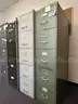 Lot of Seven (7)  4-drawer and 5-drawer Vertical Metal File Cabinets in various colors.