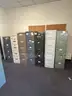 Lot of Seven (7)  4-drawer and 5-drawer Vertical Metal File Cabinets in various colors.