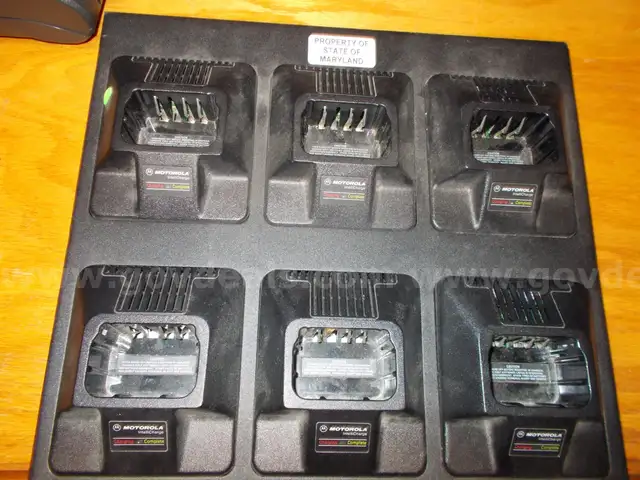 1 lot of 28 Motorola Radio, and charging stations
