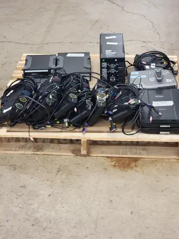 LOT OF 17 (SWITCHES, TAPE DRIVES, PROJECTOR, AND DOCKING STATIONS)