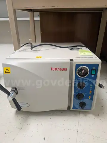 AUTOCLAVE AND EXAM CHAIR