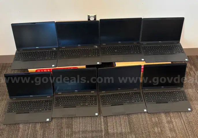 8 Laptops and 7 Docking Stations