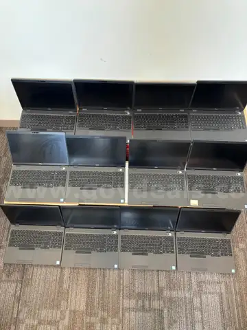12 Laptops and 8 Docking Stations