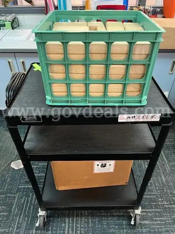 Computer carts, books, wooden block