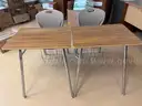 Coat rack, student desks, teacher desk, and more