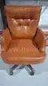 Lot # 46 Vintage Orange Captain Office Chair
