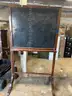 Old chalkboard on stand