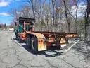 1999 VOLVO WG64 ROLL-OFF