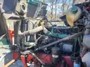 1999 VOLVO WG64 ROLL-OFF