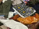 Apparel: &#x22;Clothes&#x22; (SEP25-1301)