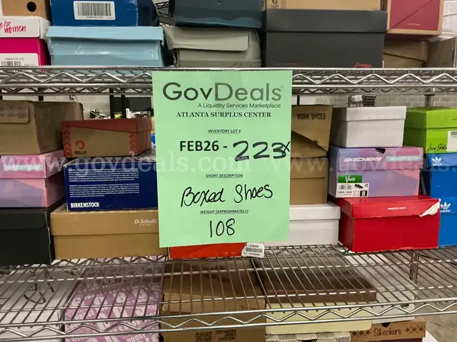 Apparel: "Boxed Shoes" (FEB26-223X)