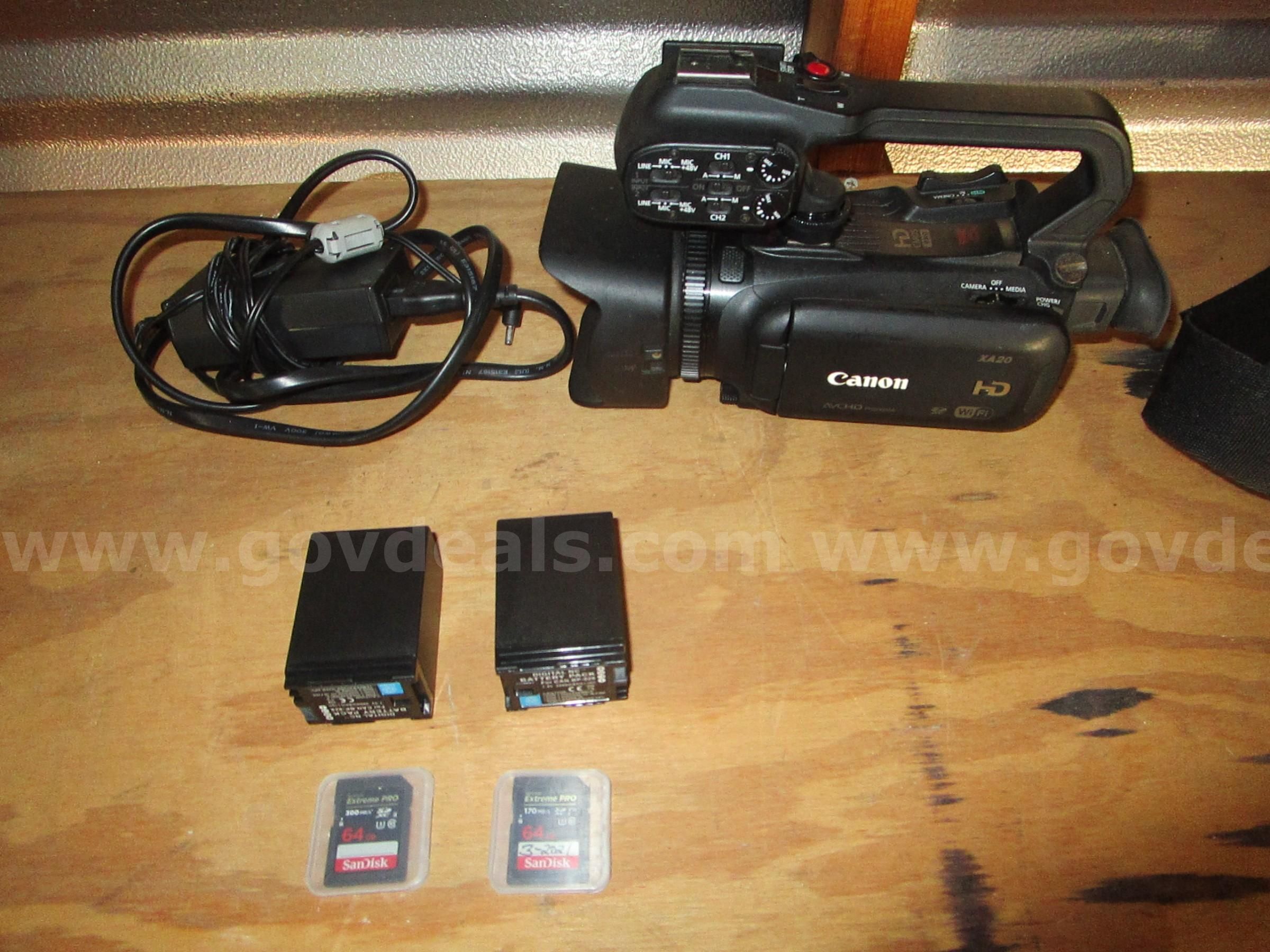 USED (1) CANON HD CAMERA, XA20 WITH 2 BATTIERIES PACKS AND 2 USED (1) CANON HD CAMERA, XA20 WITH 2 BATTIERIES PACKS AND 2