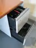 (2) USED STEELCASE DESKS; (2) USED VERTICAL FILE CABINETS