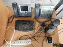 USED (1) CISCO IP PHONE 7965, (1) CISCO IP PHONE 7962, (1) PANASONIC PORT REPLICATOR, (1) BELKIN POWER SURGE PROTECTOR