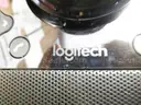 (1) USED LOGITECH WEBCAMERA W/ (1) USED REMOTE; FOR PARTS OR REPAIR