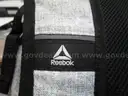 (1) USED BLACK/GREY REEBOX BACKPACK