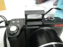 (1) USED BLACK, KODAK EASYSHARE Z8612 IS CAMERA W/ 2-KODAK BATTERIES