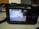 (1) USED BLACK, KODAK EASYSHARE Z8612 IS CAMERA W/ 2-KODAK BATTERIES