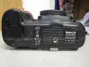 (1) USED BLACK, NIKON DIGITAL CAMERA D300, BODY ONLY; (1) USED BLACK, VIVITAR SERIES 1 FLASH ATTACHMENT, DF-383-NIK
