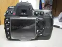 (1) USED BLACK, NIKON DIGITAL CAMERA D300, BODY ONLY; (1) USED BLACK, VIVITAR SERIES 1 FLASH ATTACHMENT, DF-383-NIK