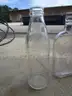 (18) USED GLASS BOTTLES; (1) USED PULL-TAB CAN