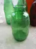 (18) USED GLASS BOTTLES; (1) USED PULL-TAB CAN