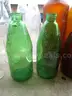 (18) USED GLASS BOTTLES; (1) USED PULL-TAB CAN